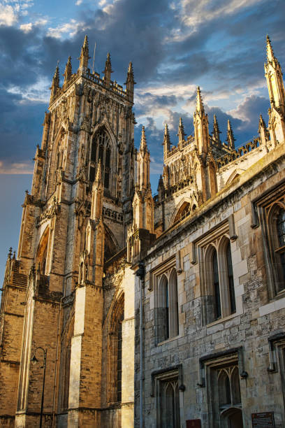 istock Gothic cathedral against a dramatic sky at sunset, showcasing intricate architecture and historical grandeur in York, UK. 2167065449