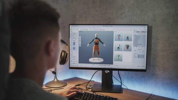 istock Teenage boy creates and draws clothes using design software on PC 2167069775