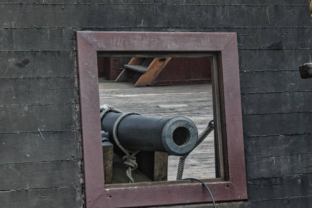 istock Cannon on an old wooden ship 2167073488