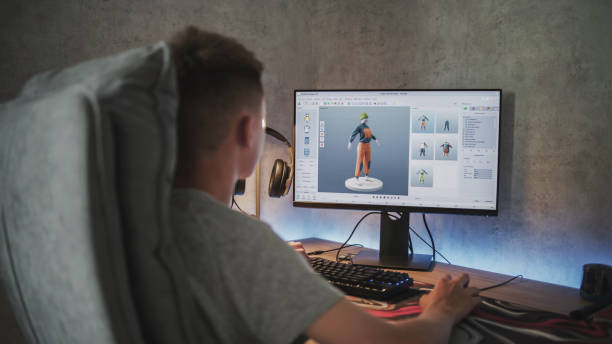 istock Teenage boy creates and draws clothes using design software on PC 2167074000