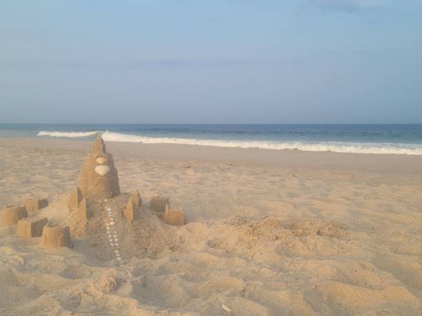 istock Sandcastle and ocean 2167075386