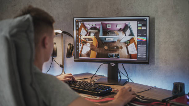 istock Caucasian teenager creates and develops stylish house interior using computer 2167075852
