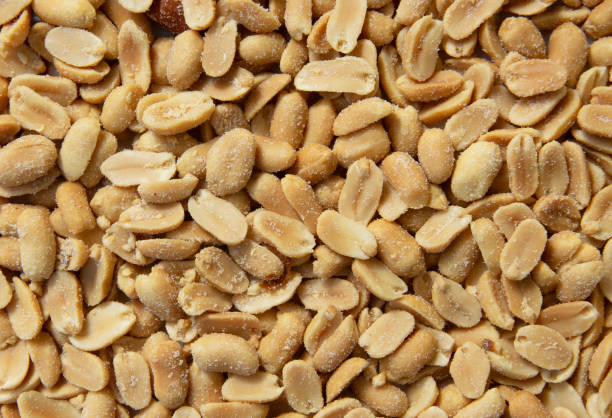 istock peanut butter, raw, food white background 2167080513