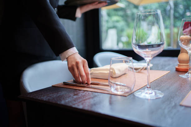 istock Close-up of hand holding table knife 2167080702