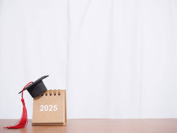 istock Study goals, 2025 Desk calendar with graduation hat. The concept for Resolution, Goal, Action, Planning, and manage time to success graduate. 2167081634