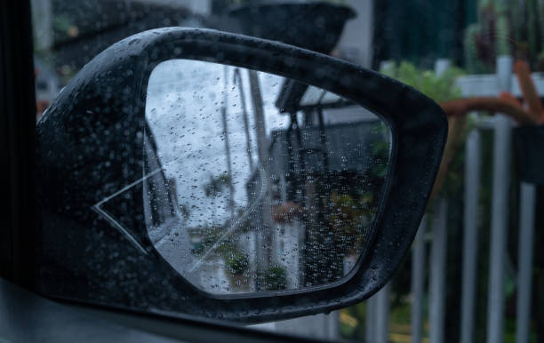 istock Dew drop on the side car glass window during raining. 2167082893