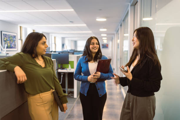istock Casual Office Discussion Among Colleagues During Daytime 2167083851