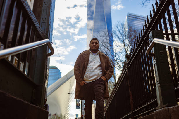 istock Urban Commuter Walking in Cityscape on Bright Morning 2167083858