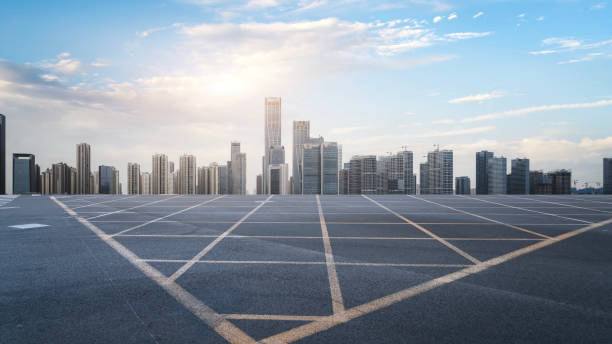 istock Expansive Urban Skyline with Empty Parking Lot at Dusk 2167090512