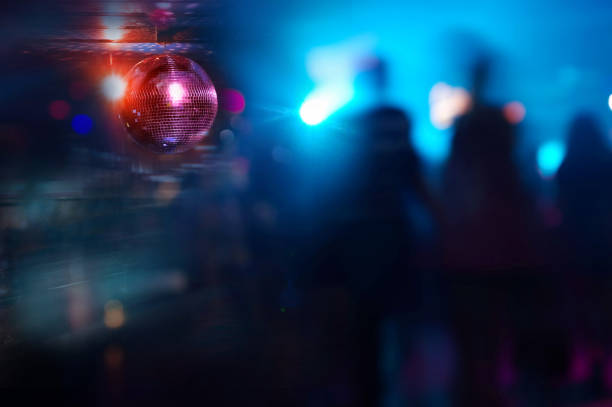 blur people at party in pub at night background
