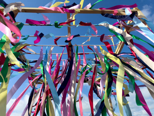 istock Multi-colored ribbons against a blue sky 2167095566