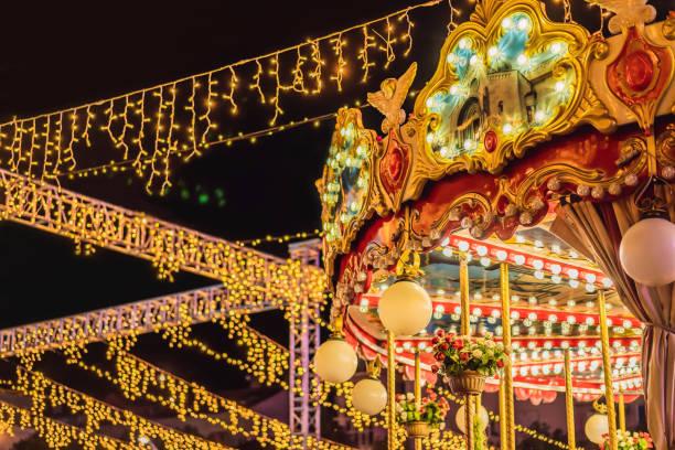 istock Illuminated swing chain carousel in amusement park at night 2167106430