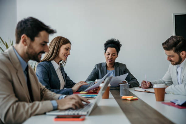 istock Happy business colleagues having a meeting 2167109810