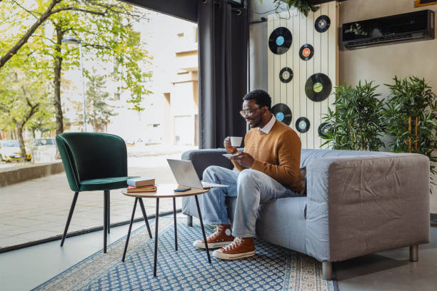 istock African American freelancer working in modern co-working space 2167122485