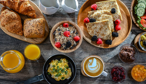 istock Breakfast served with coffee, eggs, cereals nd croissants 2167124248