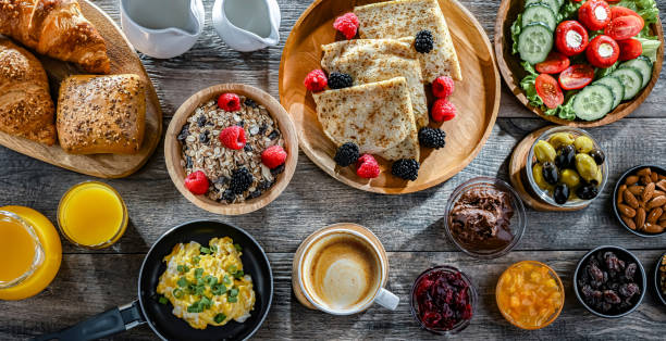 istock Breakfast served with coffee, eggs, cereals nd croissants 2167124295