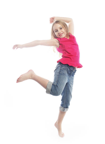 istock girl jumps on a white background 2167125164