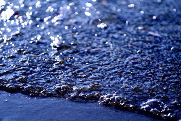 cause or allow liquid to flow over the edge of its container, especially unintentionally
