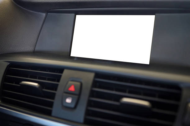 istock Monitor in car isolated blank screen for navigation maps and GPS rearview camera and parking assistant. Car display with blank white screen for design mock up, copy space. 2167130784