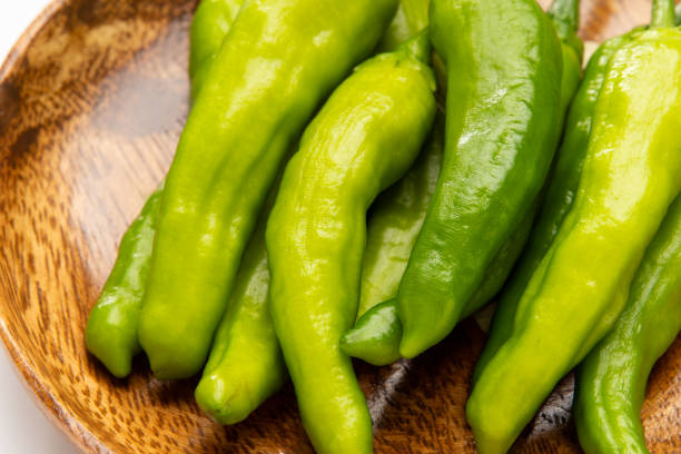 istock Green peppers on white background 2167134304