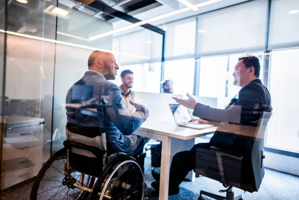 istock Coworkers talking during a meeting at office 2167140568