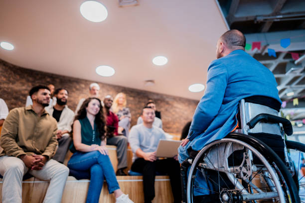 istock Businessman talking during presentation at office 2167140778