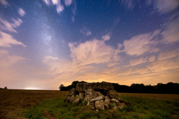 istock Small dolmen in a field under a starry sky with the Milky Way 2167148768