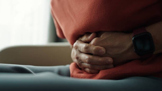 istock Mature woman stomach ache. 2167154007