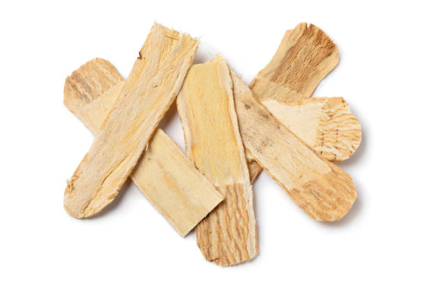 istock Heap of dried Astragalus root close up on white background 2167157591