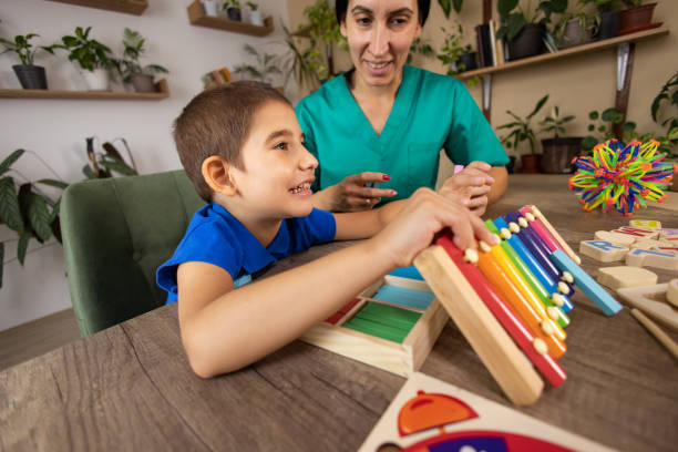 istock Sensory Fun with Nurse for Boy with Autism 2167161936