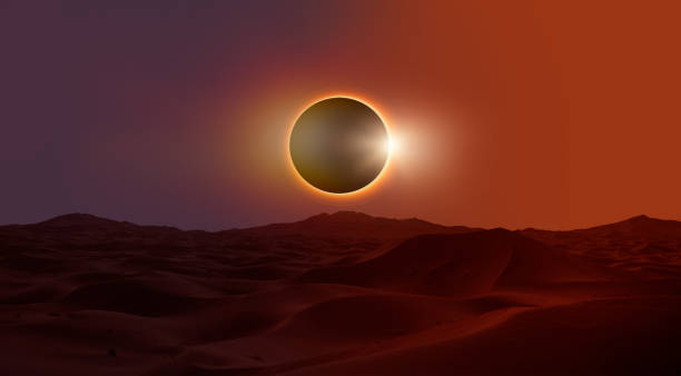 istock Beautiful sand dunes in the Sahara desert at sunrise with solar eclipse  - Sahara, Morocco 2167162938