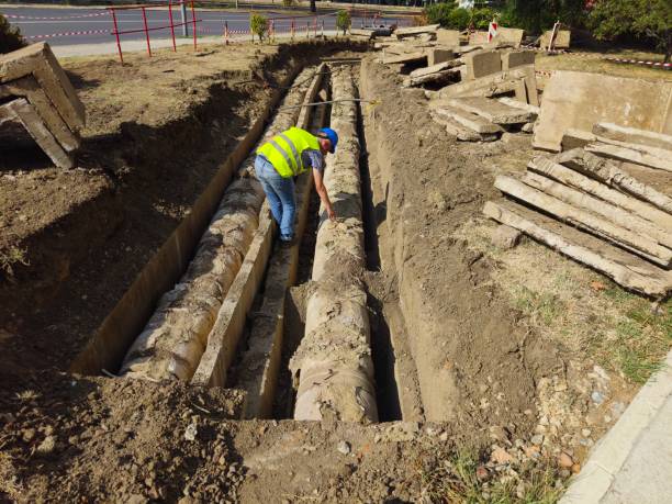 istock Repairing old district heating pipeline in concrete trench 2167164746