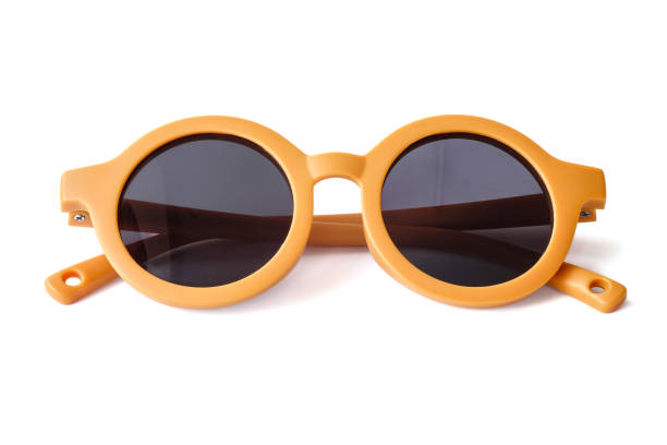 istock Yellow kids sunglasses close up on white background. 2167166701