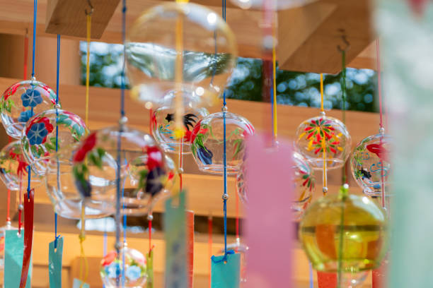 istock Vibrant Glass Wind Chimes in Summer Breeze 2167169254