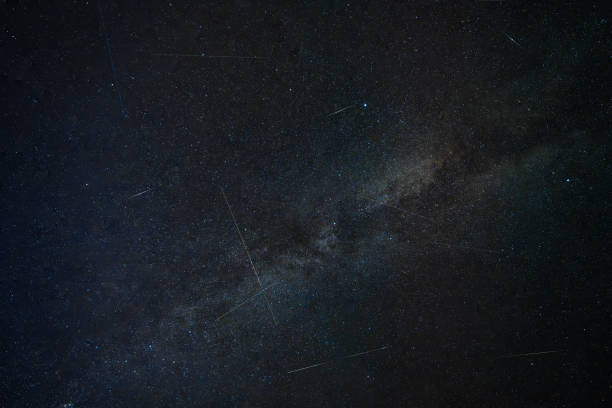 A view of the Perseids in the night sky with the Milky Way in the background