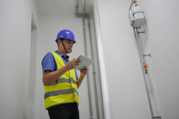 istock The man inspects the house. Contractor, Inspector 2167171951