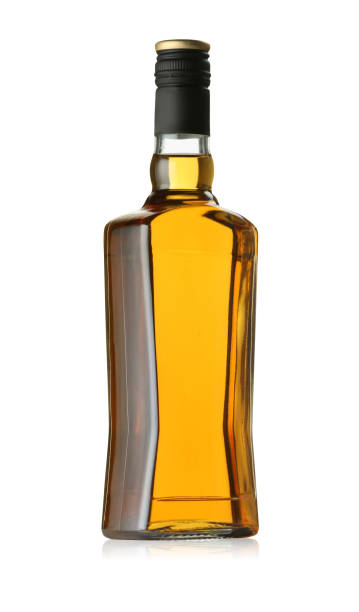 istock Whiskey in glass bottle isolated on white 2167182707