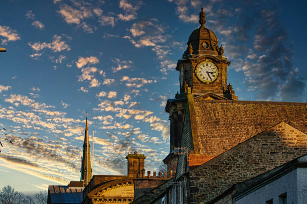 istock Historic clock tower against a vibrant sunset sky with scattered clouds in Lancaster. 2167189955