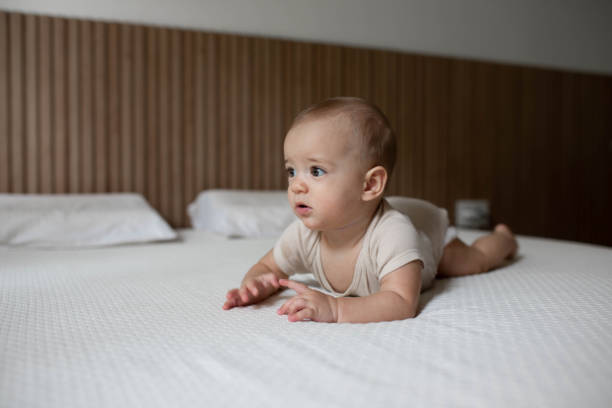 istock Baby on the bed 2167190086
