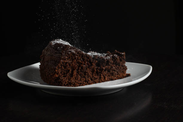 istock Slice of Chocolate Cake with Powdered Sugar 2167190858