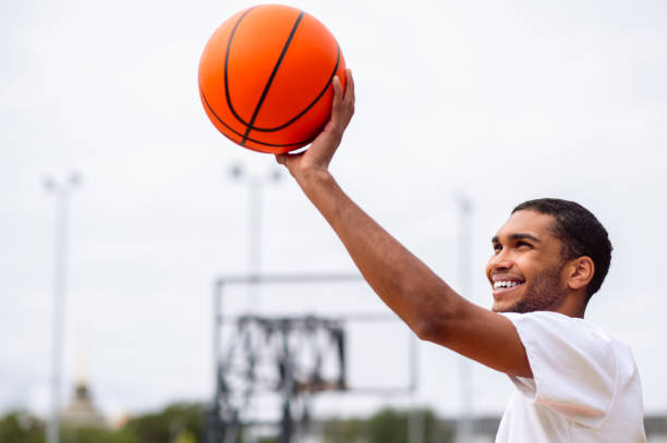 istock Basketball player getting ready for throwing the ball to the basket 2167192811