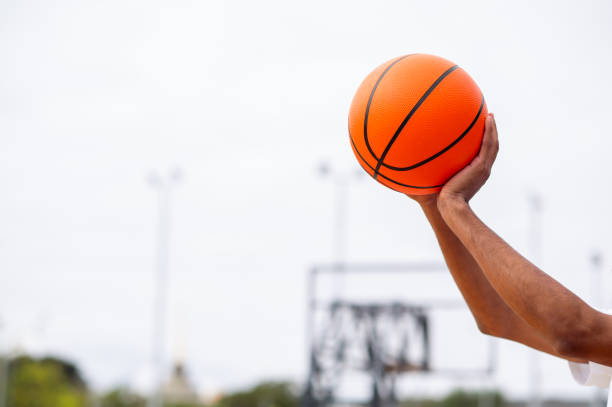 istock Basketball player getting ready for throwing the ball to the basket 2167192823