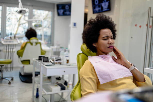 istock Patient in pain awaiting dental exam 2167193512