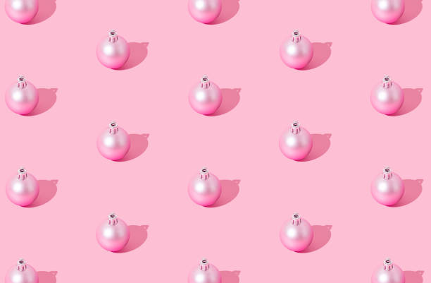istock Christmas pattern composition made of pink Xmas bauble on pastel pink background. Creative minimal Christmas and New Year concept. Festive holiday pastel backdrop. Christmas aesthetic background. 2167200404