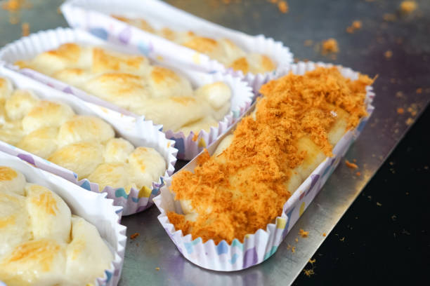 Variety of breads and buns on a cooling rack