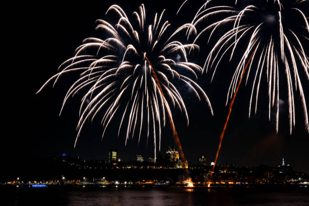 istock Fireworks over St. Lawrence River in Quebec City view From Levis, Quebec, Canada 2167206513