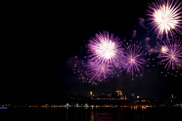 istock Fireworks over St. Lawrence River in Quebec City view From Levis, Quebec, Canada 2167206514
