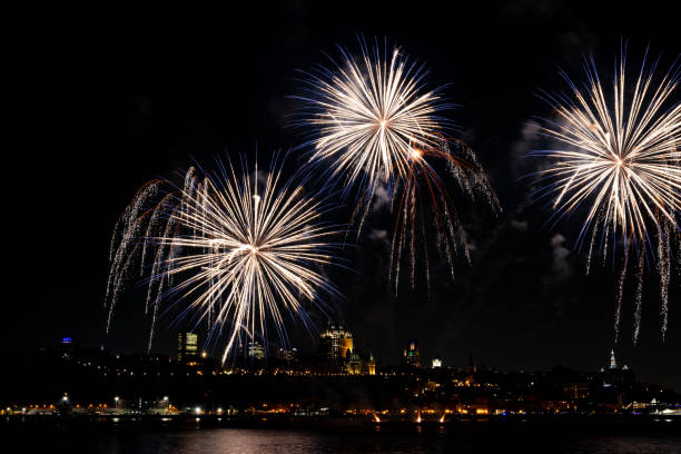 istock Fireworks over St. Lawrence River in Quebec City view From Levis, Quebec, Canada 2167206518