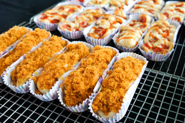 istock Variety of breads and buns on a cooling rack 2167209485