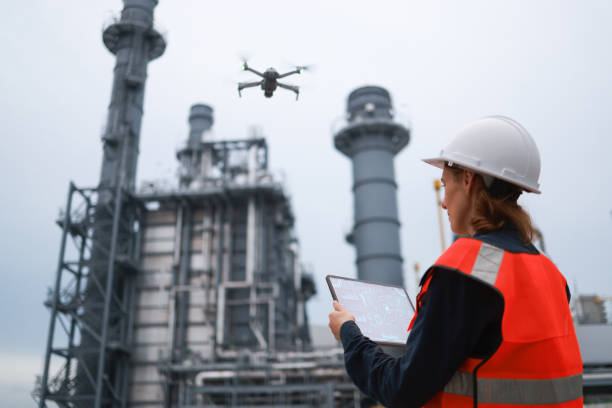 The thermal power plant engineers team utilizes technology for the inspection and surveying of a thermal power plant. Surveyors and exploration teams deploy high survey instruments to observe the power plant and assess its security measures.